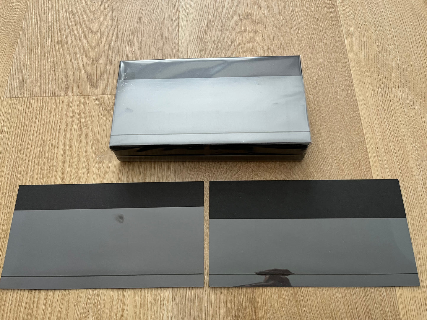 100 Used Black Stock Cards with Raised Margin